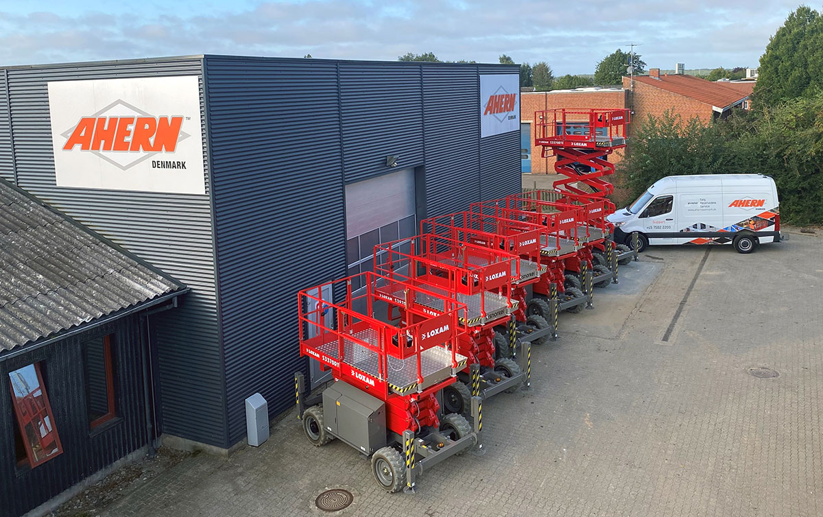 Loxam Denmark branded lithium compact branded scissor lifts ready for delivery from Ahern Denmark
